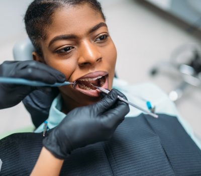 Dentist examines the teeth, dental clinic